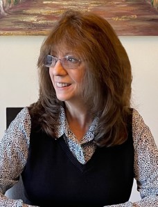Reviewer and Author, Mae Clair