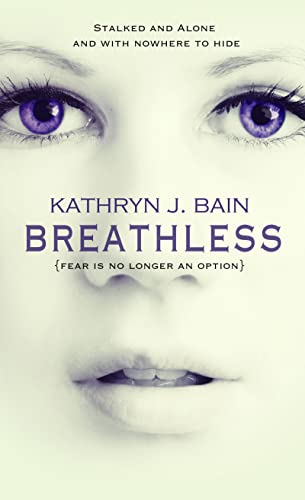 Close up of woman's facial features in soft tones except for emphasis on violet eyes